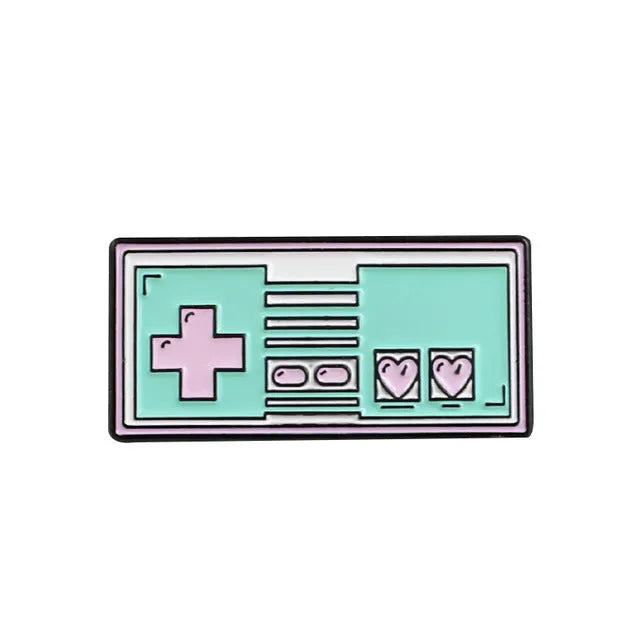 Alloy game console badge with magnetic backing in CC1122, CC1123, and CC1124 colour options