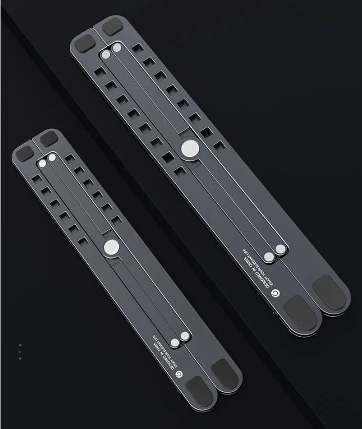 Portable aluminium laptop stand folded showing adjustable height mechanism