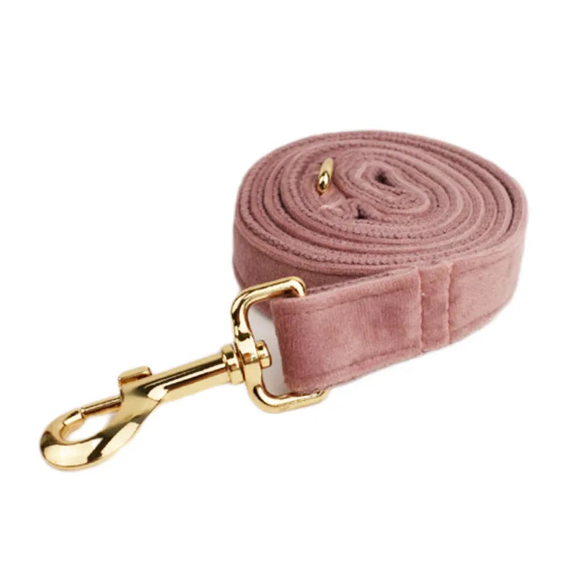 Light purple pink velvet dog collar with metal D-ring on a grey background