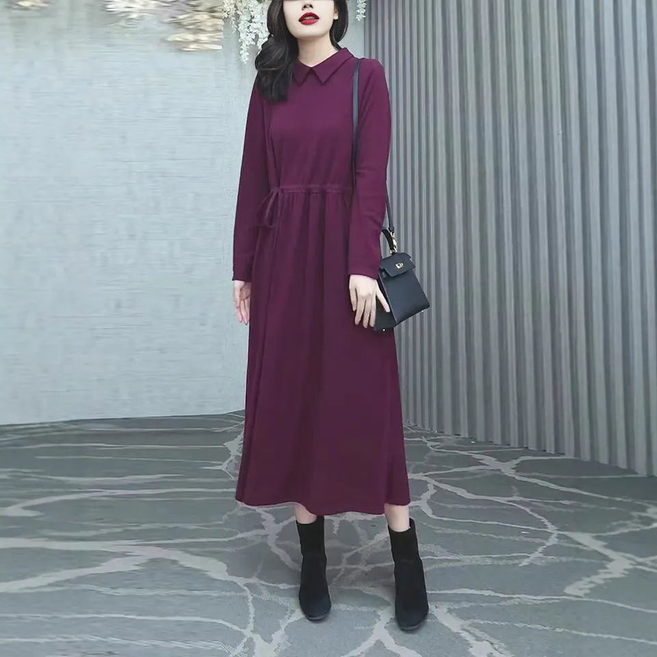 Purplish red long sleeve plus size dress for women, urban winter commute style.