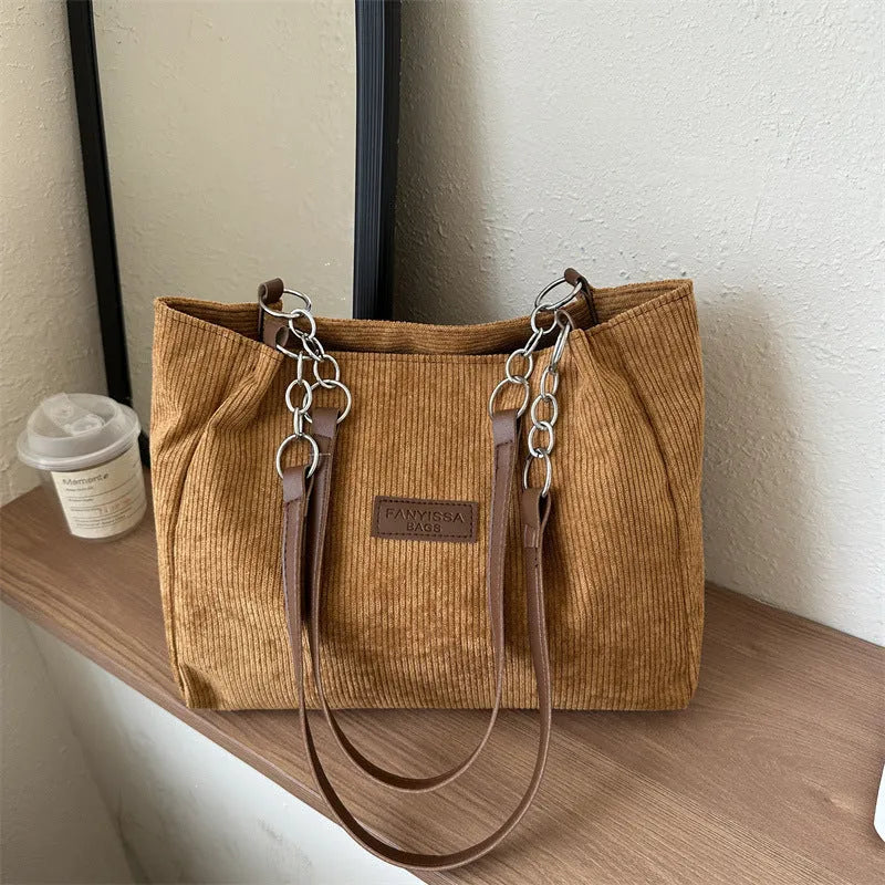 Corduroy tote handbag for women showing large capacity design and one-shoulder strap