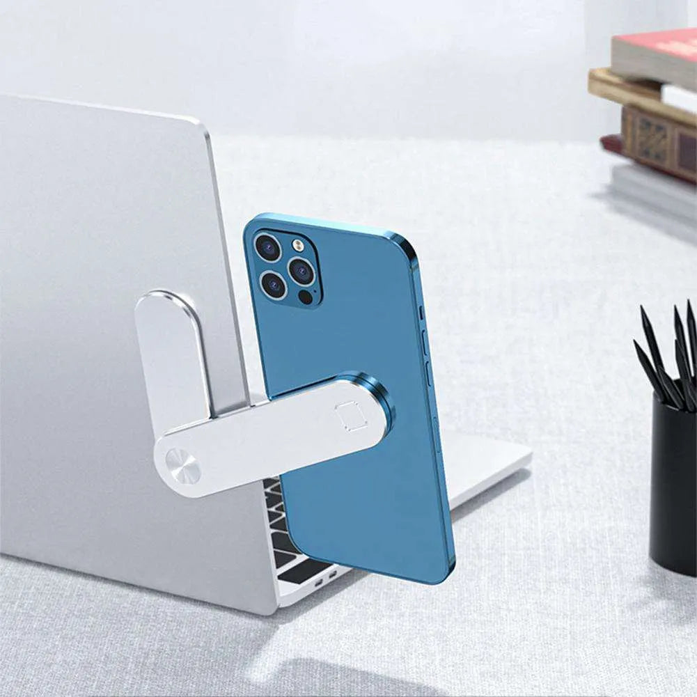 Aluminium laptop phone holder with magnetic clip mounted on laptop edge holding smartphone