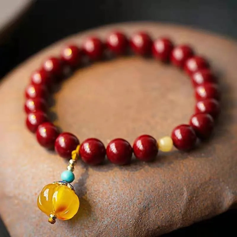 Handmade gold cinnabar wave bracelet with copper beads in national style
