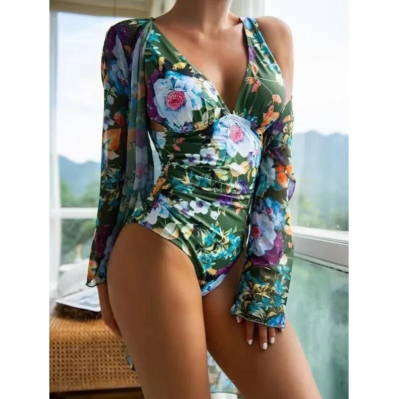 Women's floral print bikini three-piece swimsuit with a matching coat, shown in one of seven available colours.