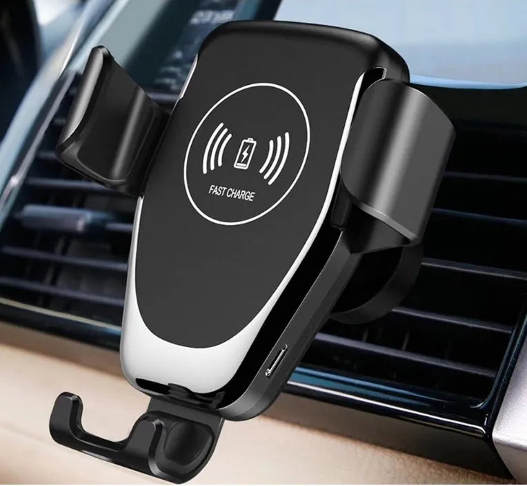 Black car wireless charger for iPhone mounted on a car vent with phone secured in automatic gravity clamp.
