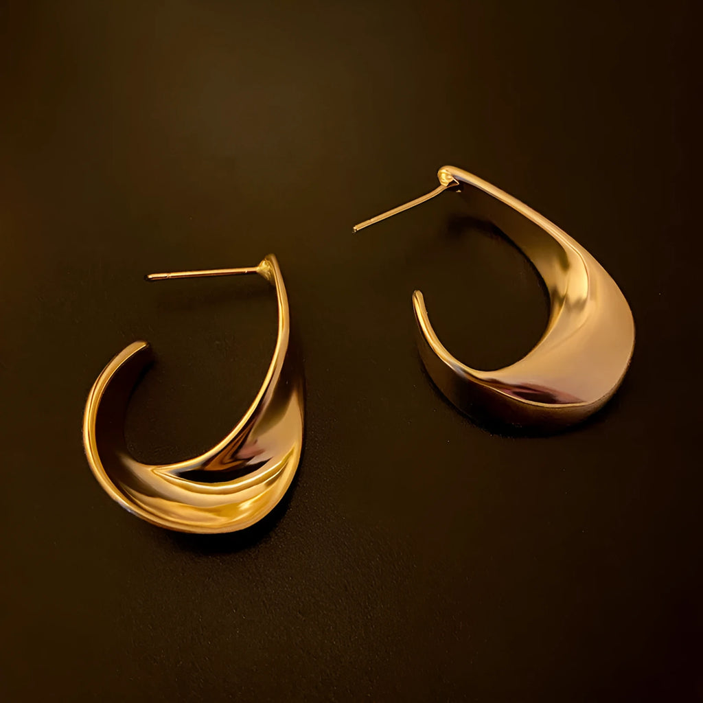Twisted geometric metal earrings with gold or silver electroplated finish