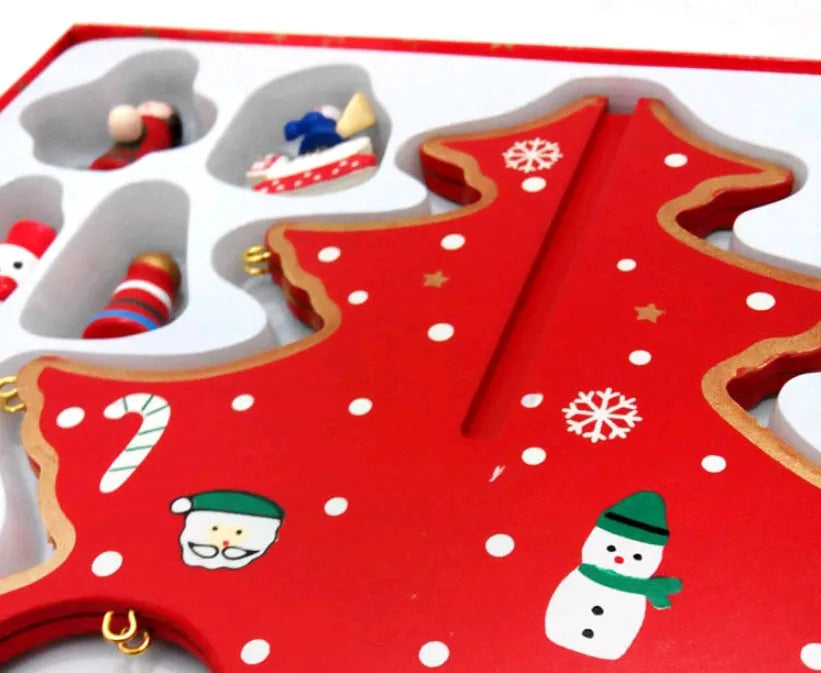 Hand-painted wooden Christmas tree decoration in traditional red and green colours
