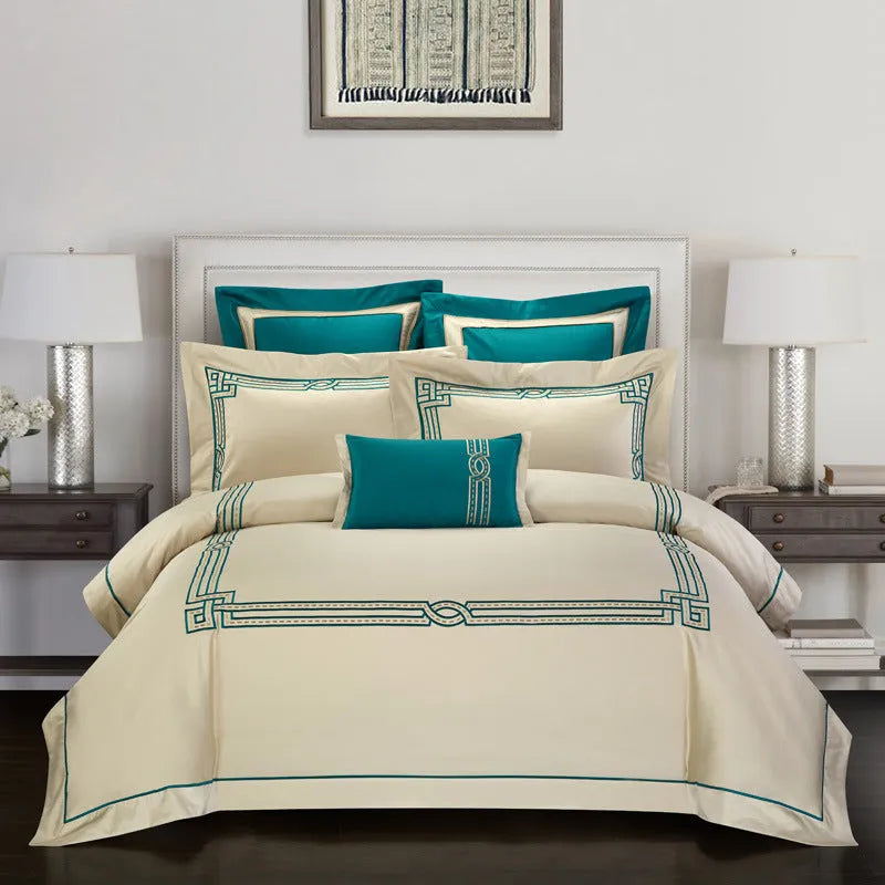 Four-piece cotton embroidery bedding set with detailed pattern designs