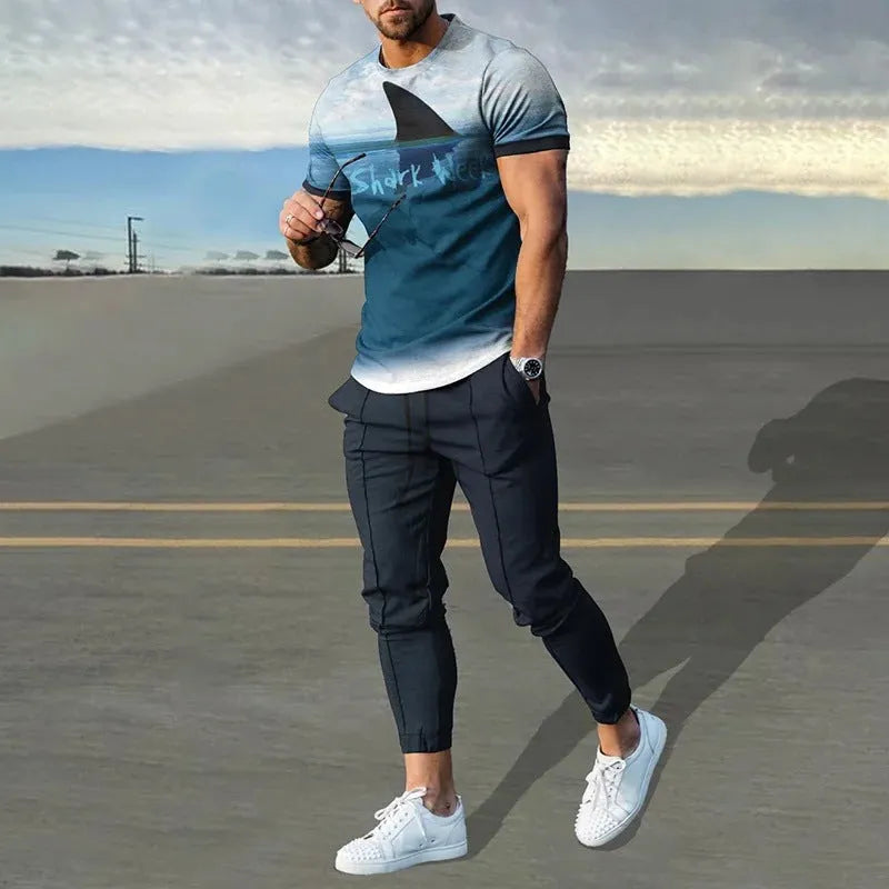 Men's short-sleeved printed sport suit set showing t-shirt and trousers in polyester blend fabric