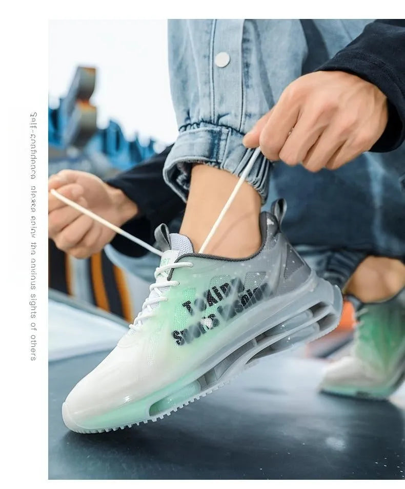 Men's black and green heightened platform casual shoes with mesh upper and rubber sole.