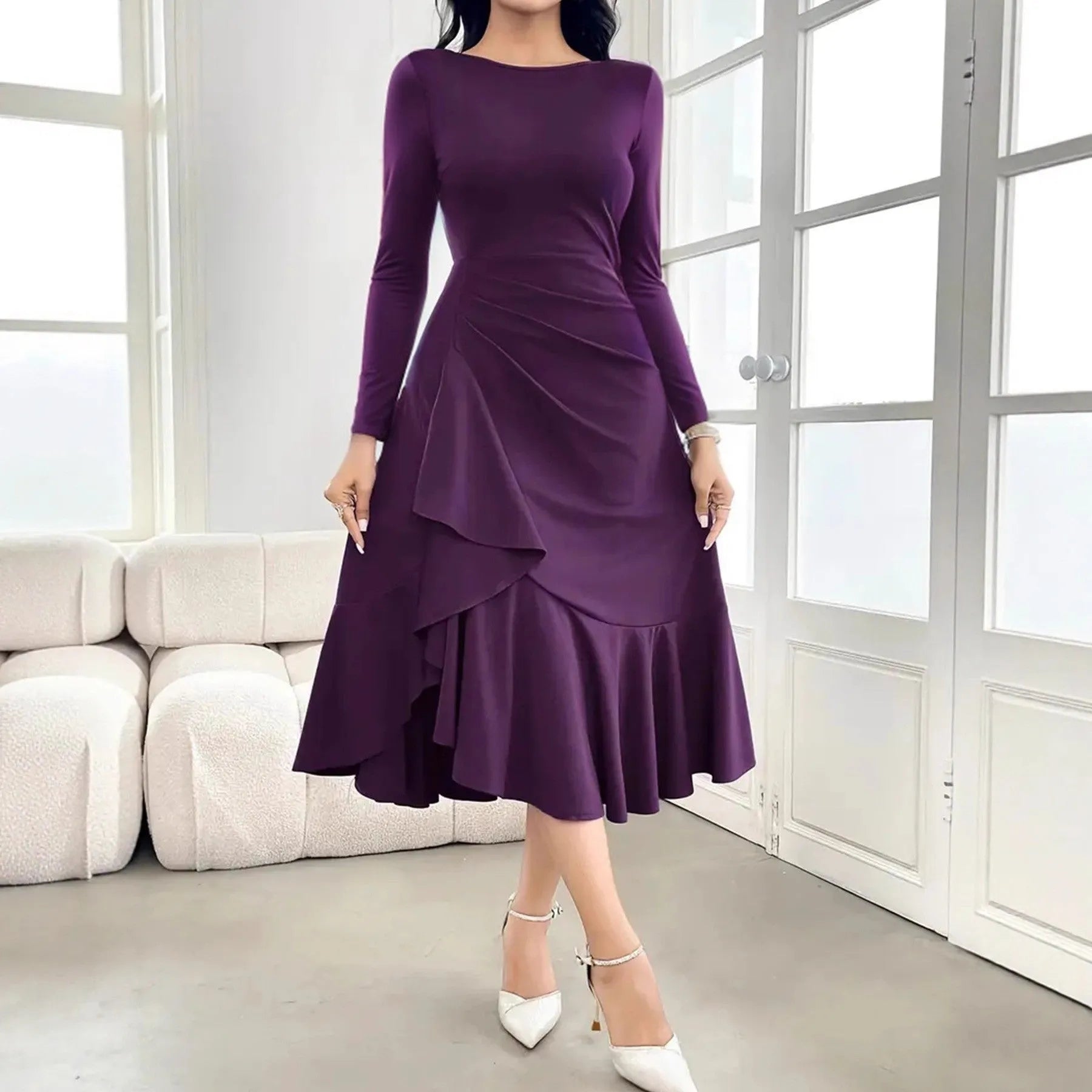 Purple women's long sleeve dress with ruffles and a round neck, showing mid waist fit.