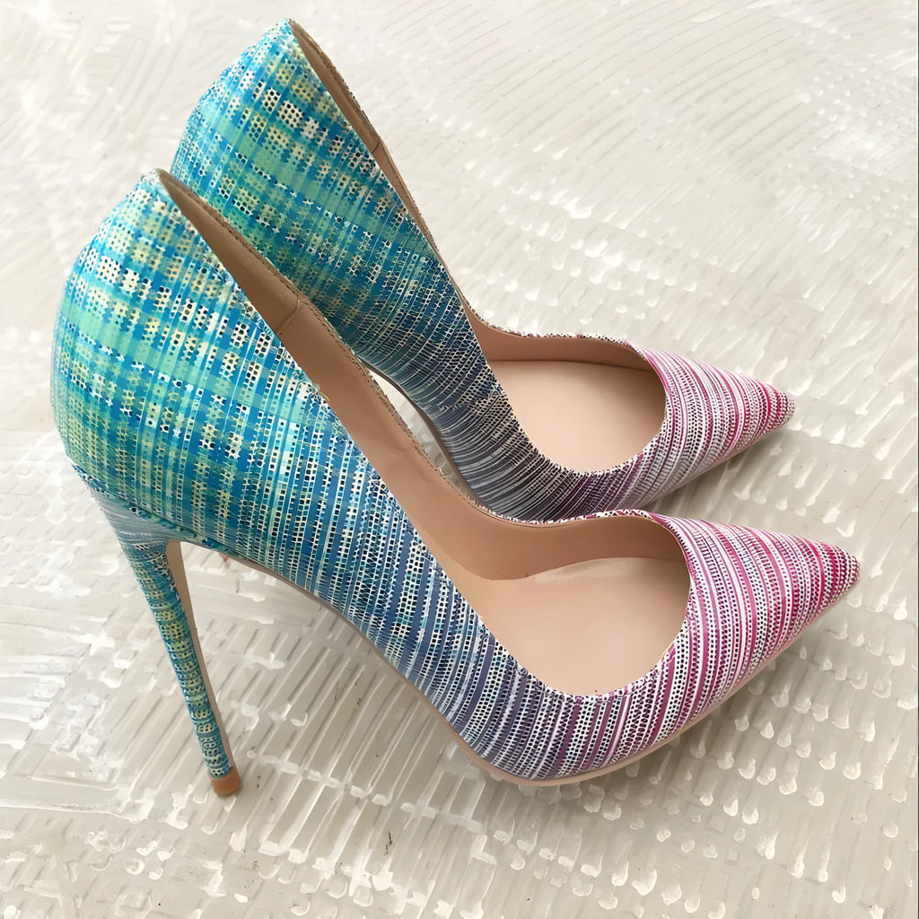 Ladies pink blue gradient patent leather pointed toe high heels on a white background
