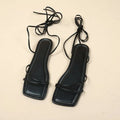 Women's flat sandals with white ankle bandage wrap, square toe, and lace-up front.