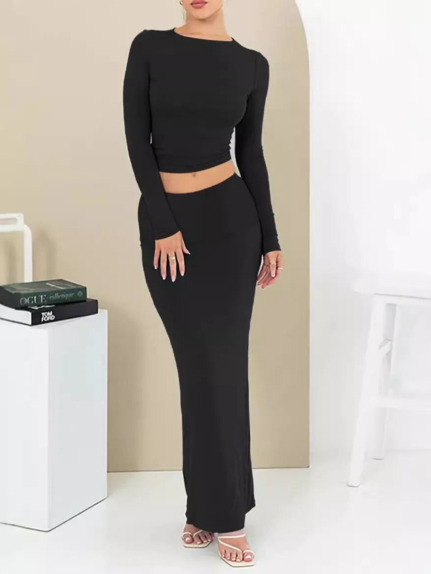 Women's black polyester two-piece suit with three-quarter sleeve top and long skirt, sweet style.