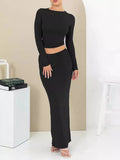Women's black polyester two-piece suit with three-quarter sleeve top and long skirt, sweet style.