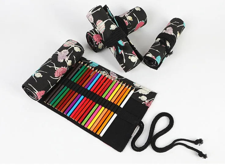 Canvas roll-up pencil case with ballet girl print, shown unrolled to display multiple pencil loops.