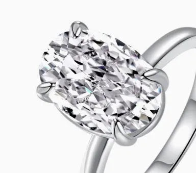 Women's oval 9 silver ring with four-prong claw setting and cold enamel finish