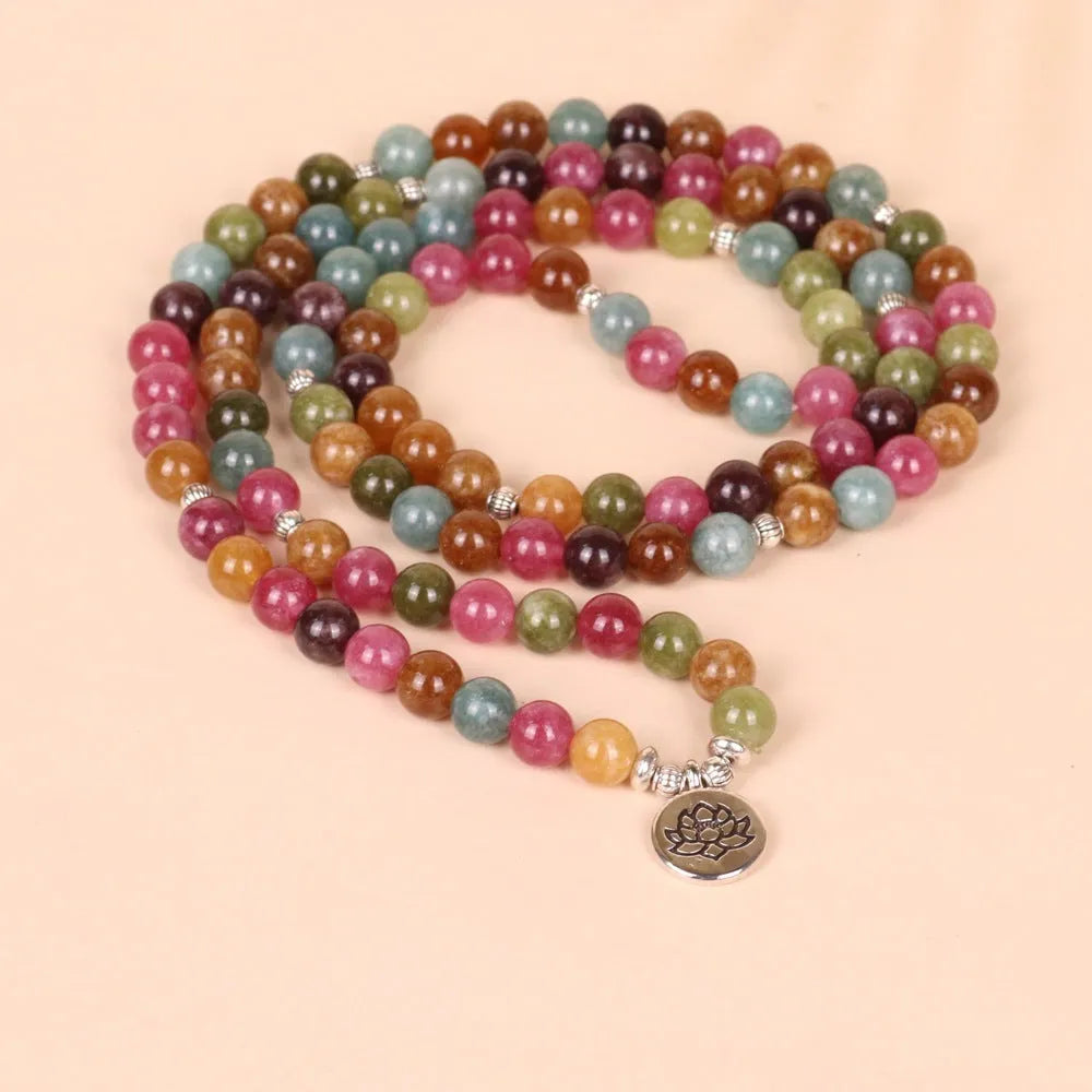 108-bead lotus hanging bracelet with tourmaline-coloured alloy beads on adjustable string