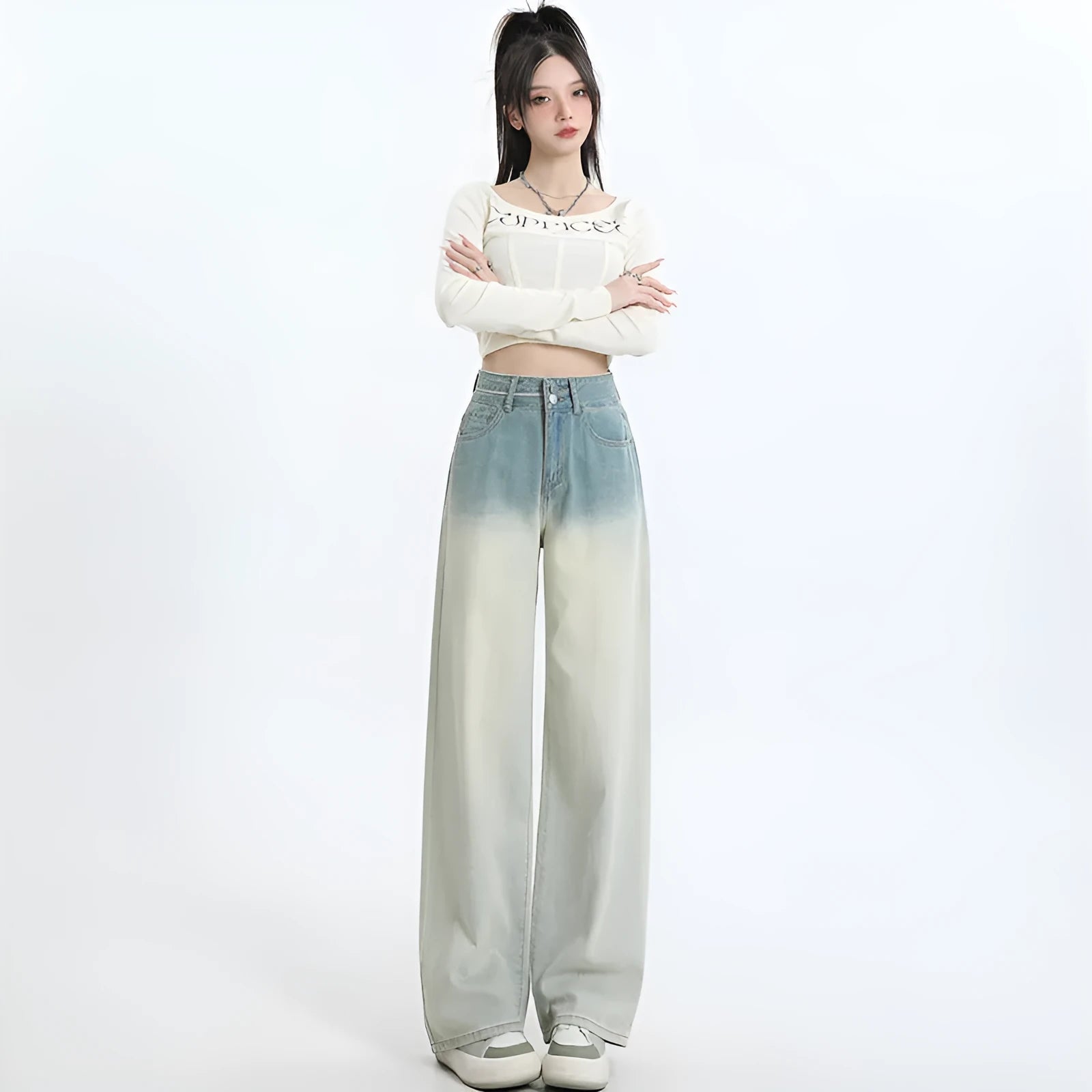 Women's gradient blue straight-leg denim trousers with wide leg design on hanger