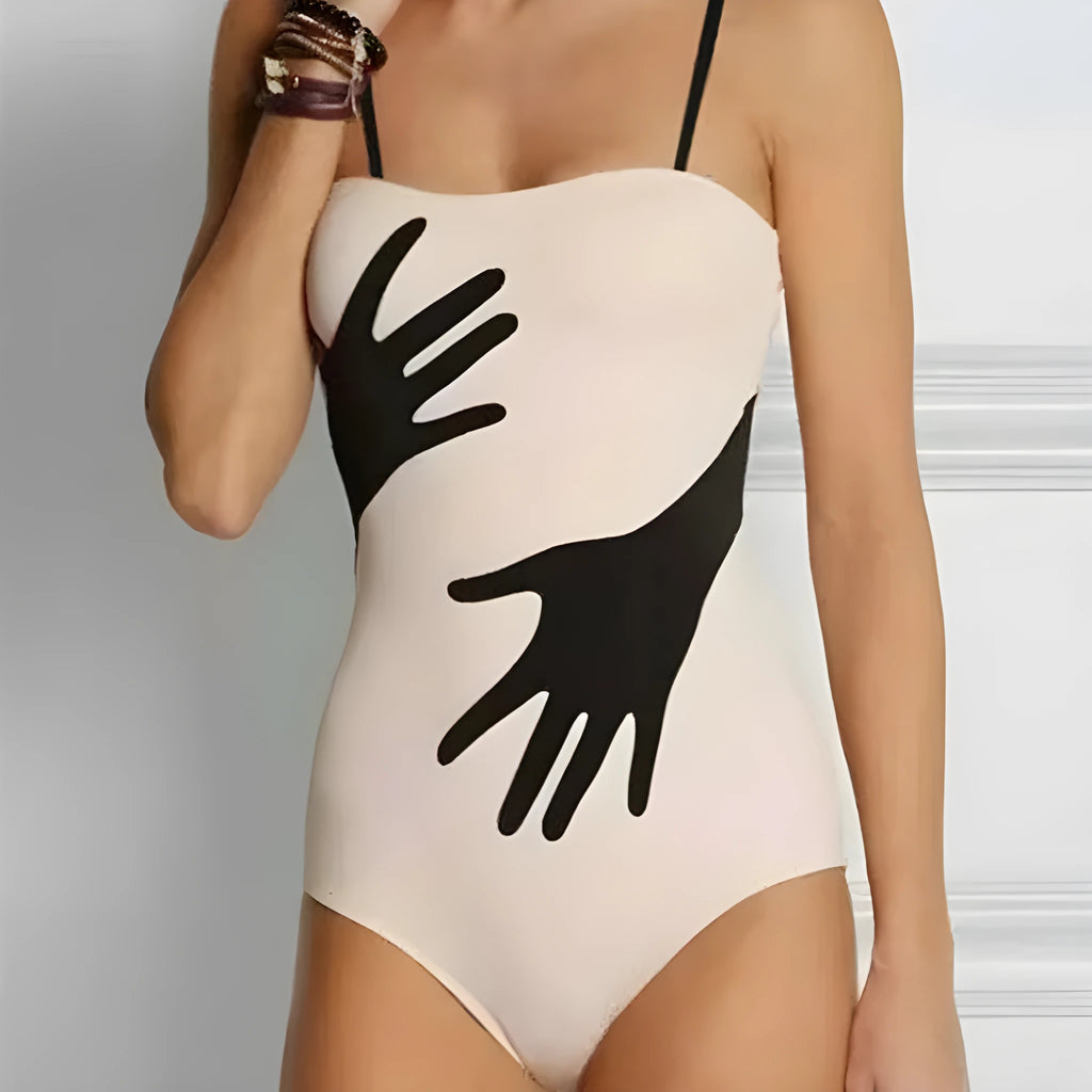 Women's one-piece bikini swimsuit in Polyester fabric, size range S to XL.