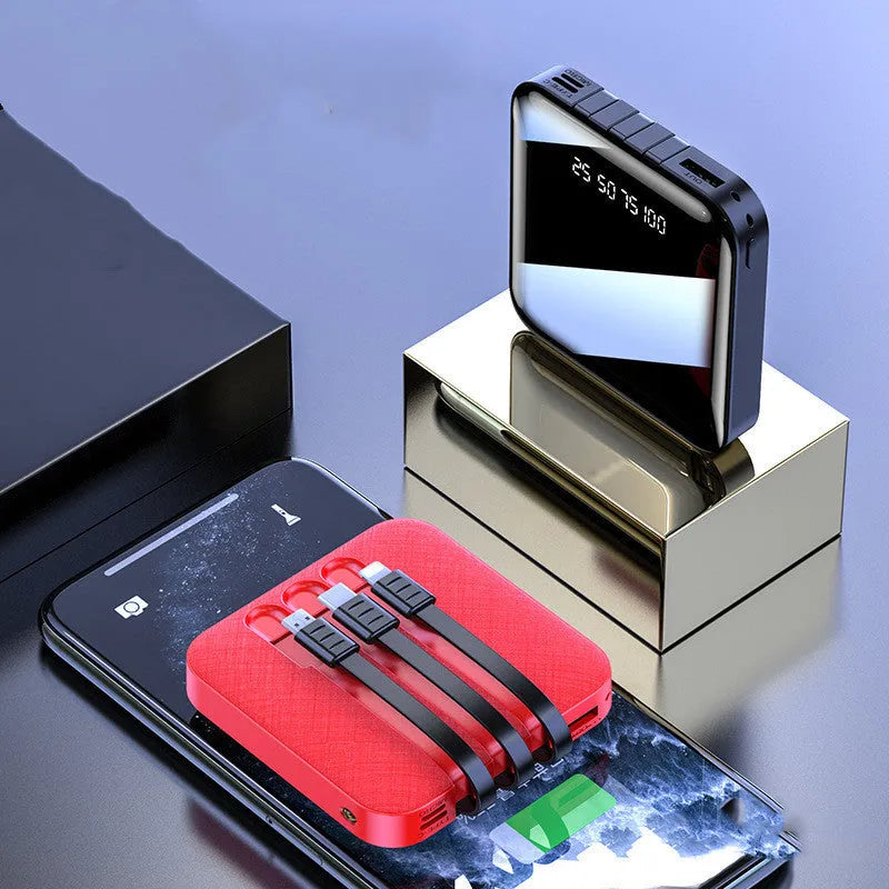 Black rectangular power bank with integrated charging cable showing 10000mAh capacity