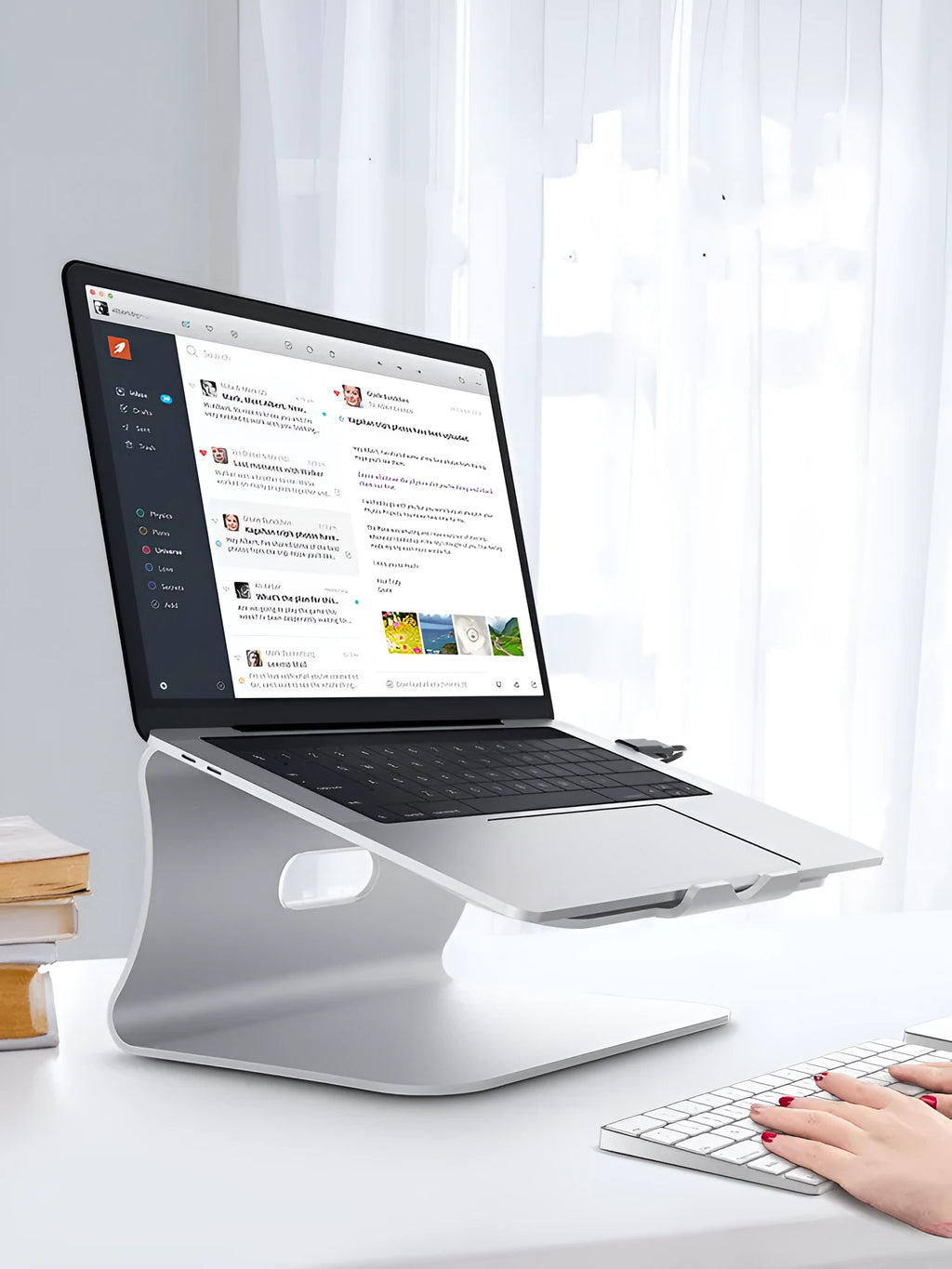 Aluminium alloy laptop cooling bracket with striped silver finish and adjustable rotary stand.