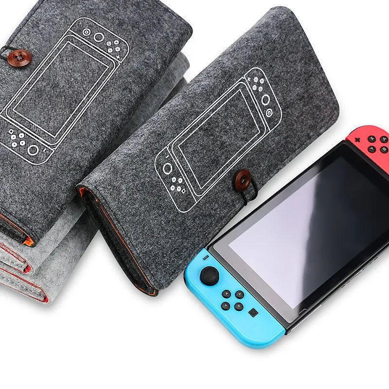 Black felt pouch case for Nintendo Switch open to show console compartment and 5 game card slots.