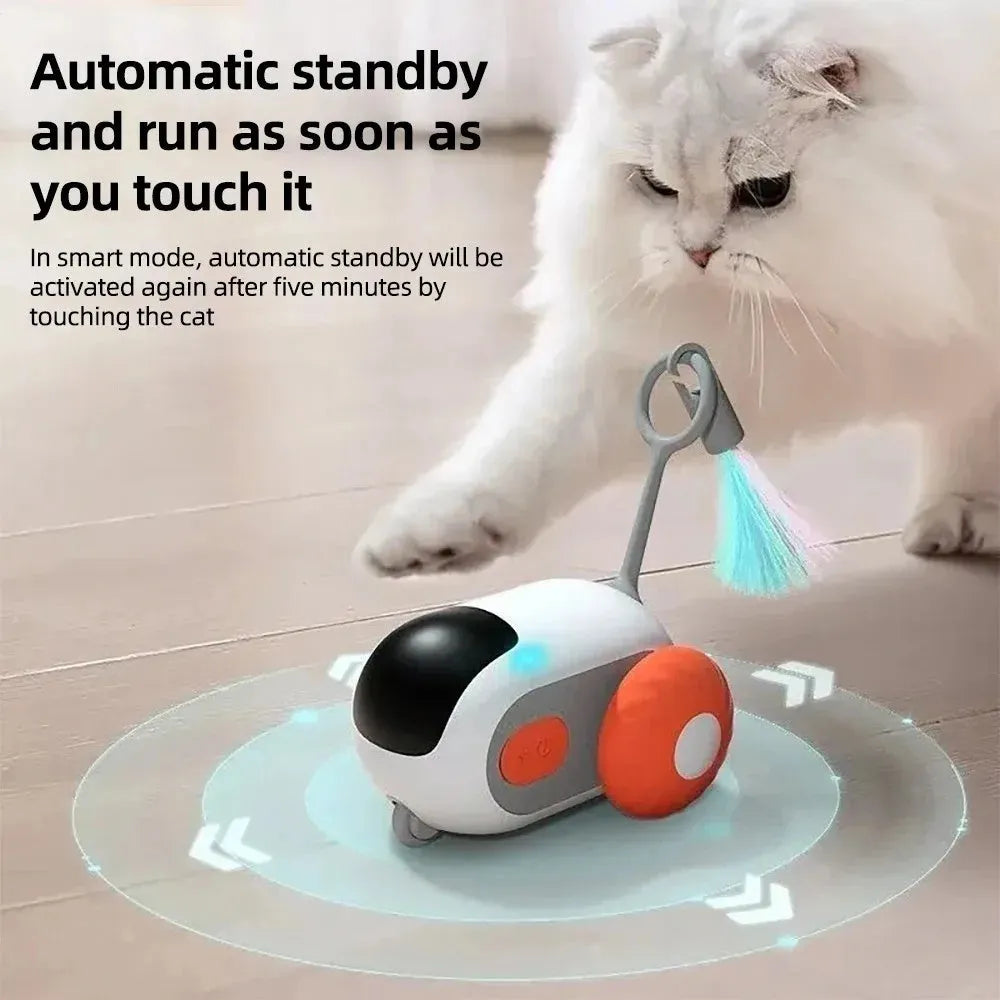 Interactive remote control cat toy car with feather teaser attachment in blue or orange colours