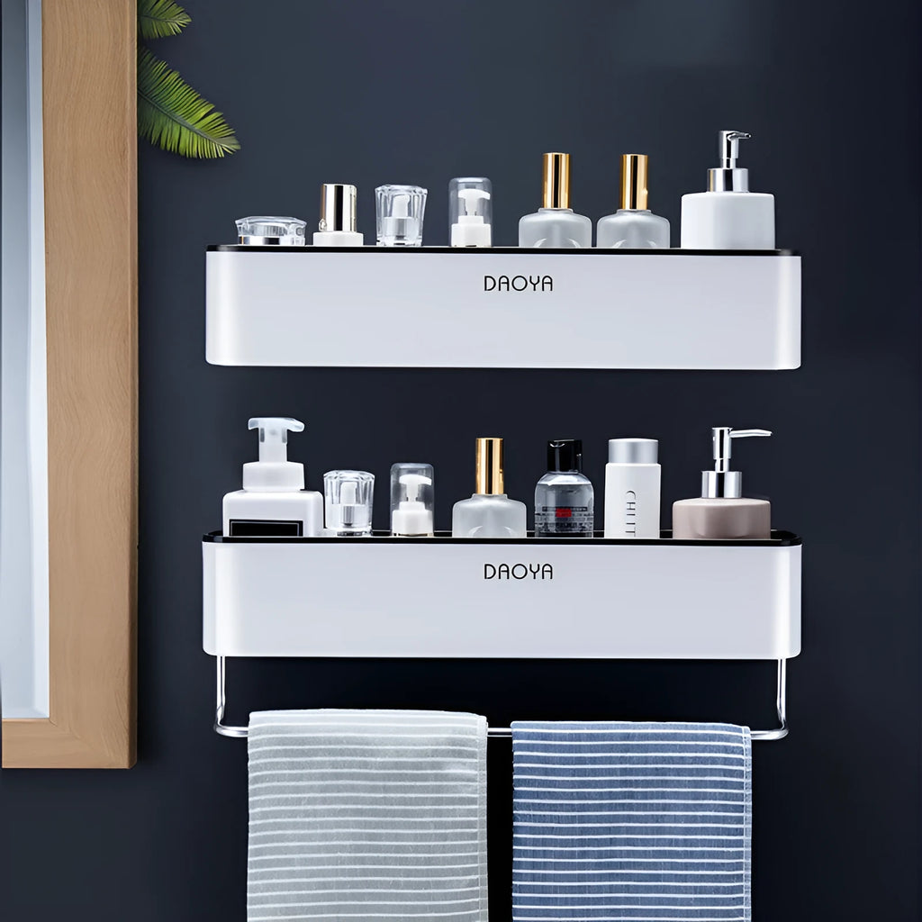 Black adhesive bathroom wall shelf holding shampoo and shower gel bottles.