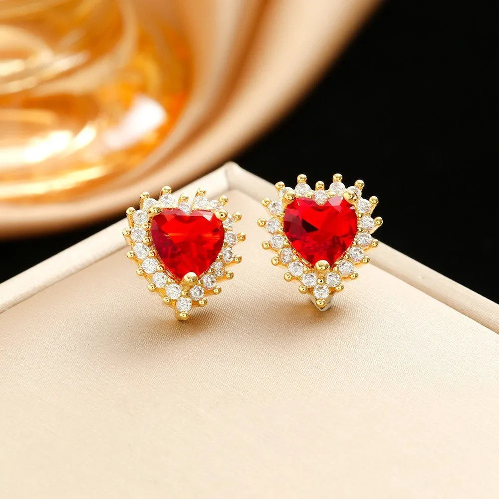 Gold red heart and flower pendant necklace with matching ear studs and ring, made from titanium steel.