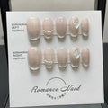 Women's blush pink false nails set with fourteen pieces in XS S M L sizing options