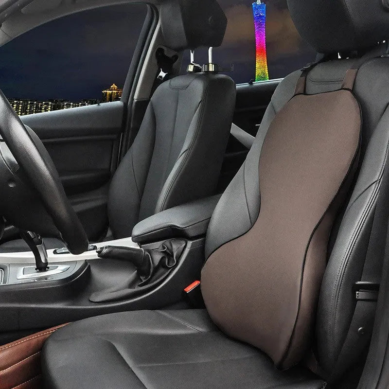 Memory foam car lumbar support cushion in neutral colour with universal fit design