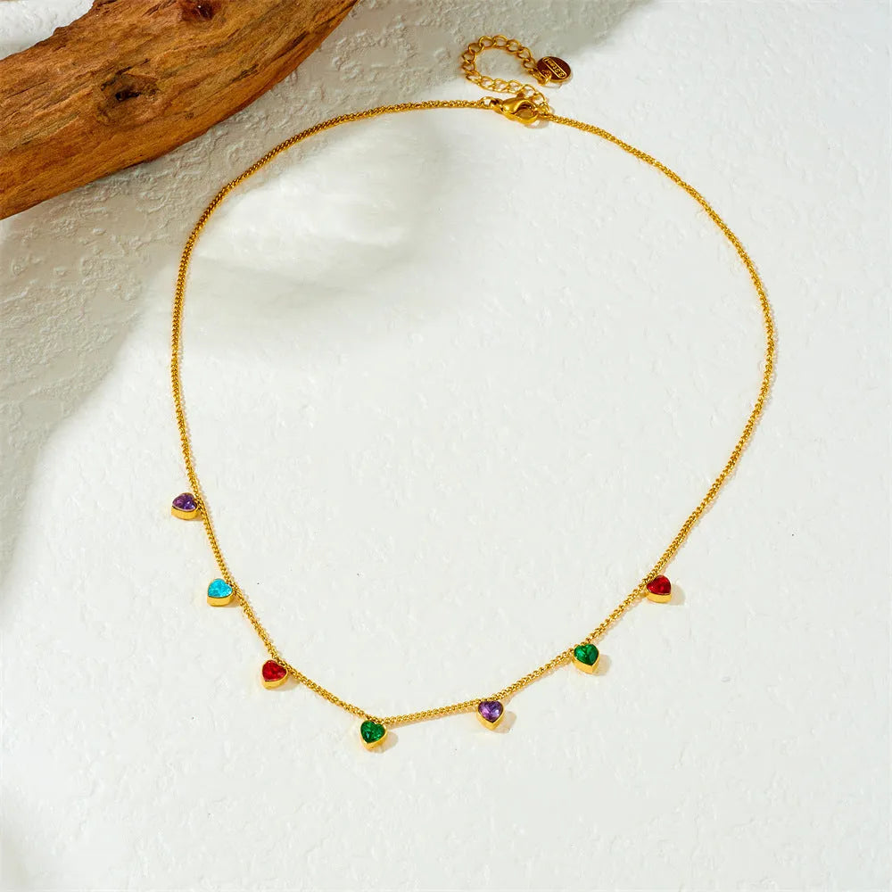 Gold-coloured heart pendant necklace on a stainless steel chain for women.