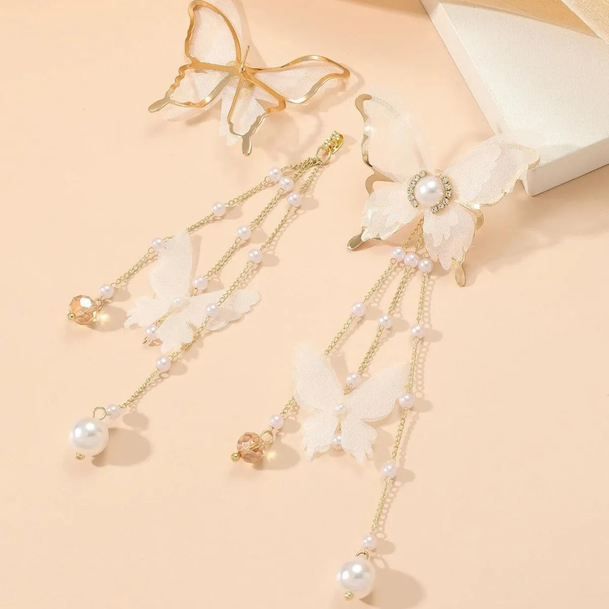 Butterfly tassel lace pearl rhinestone earrings with white electroplated finish