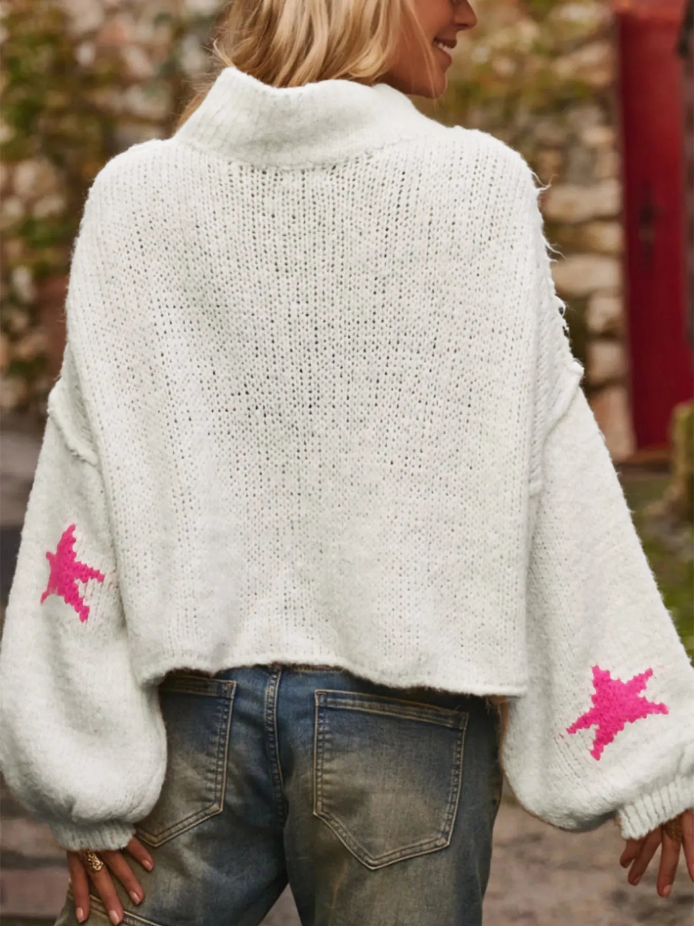 Women's white turtleneck pullover with five-pointed star pattern and loose fit design