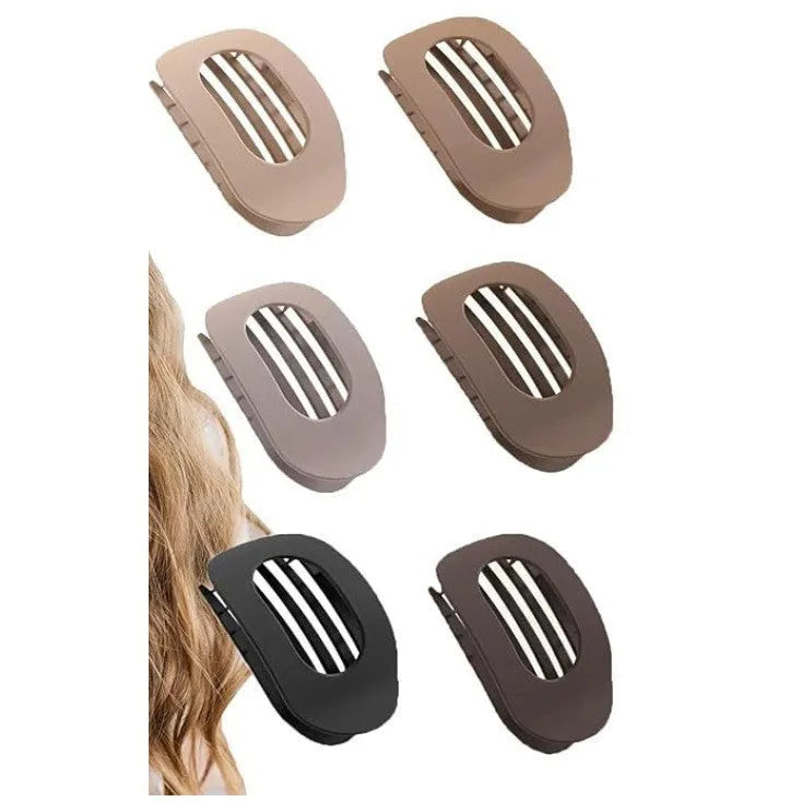 Six plastic hair clips with quadrilateral shape and frosted grip surface in nude and rose red colours