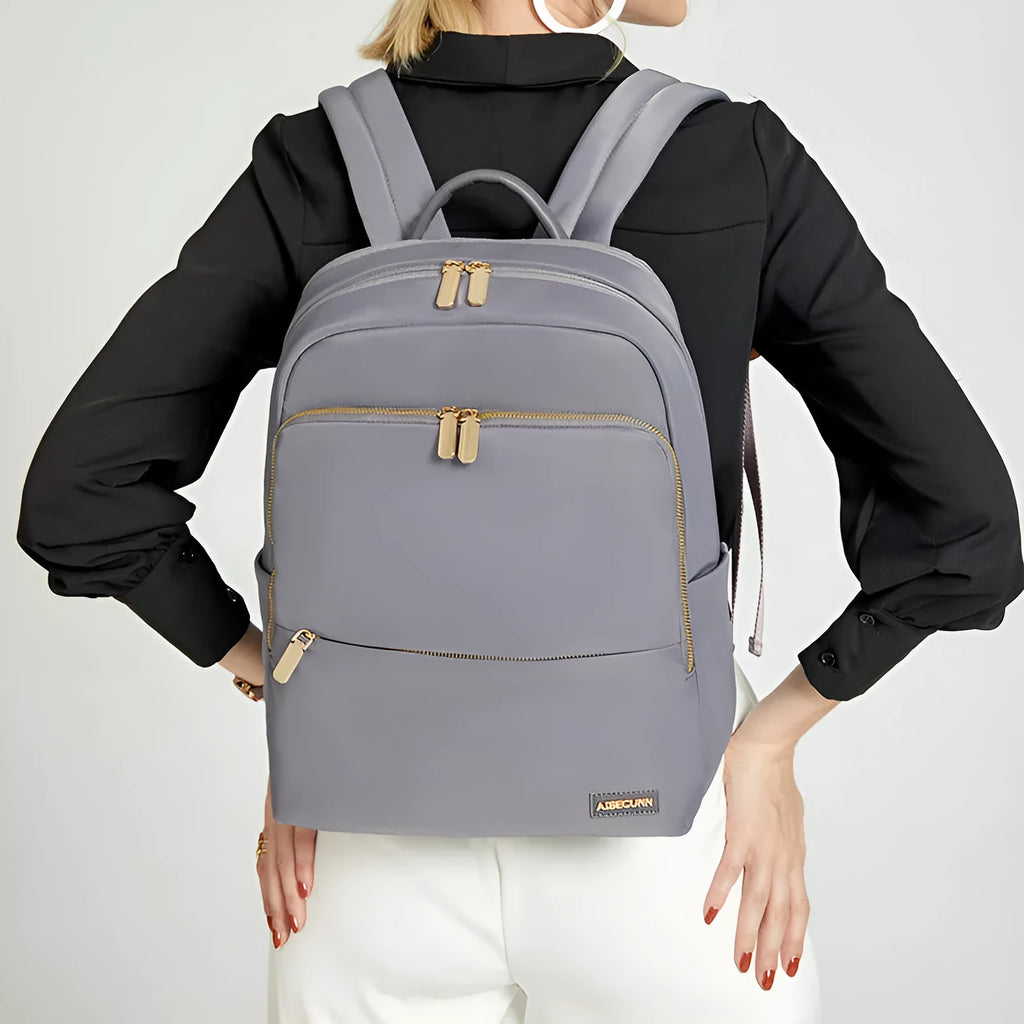 Black Oxford cloth women's large capacity backpack with anti-theft features.