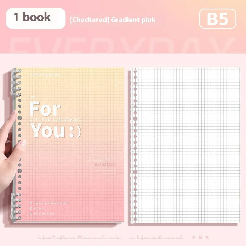 Removable coil-bound gradient colour notebook in A4 and B5 sizes on a desk.