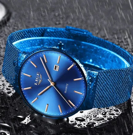 Men's stainless steel wristwatch with 40mm dial in black, blue, or two-tone colour options.