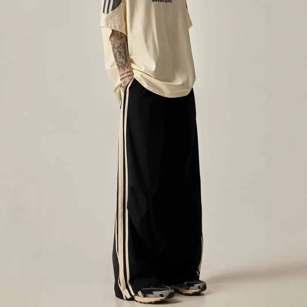 Men's black wide-leg climbing trousers with high waist and straight leg design