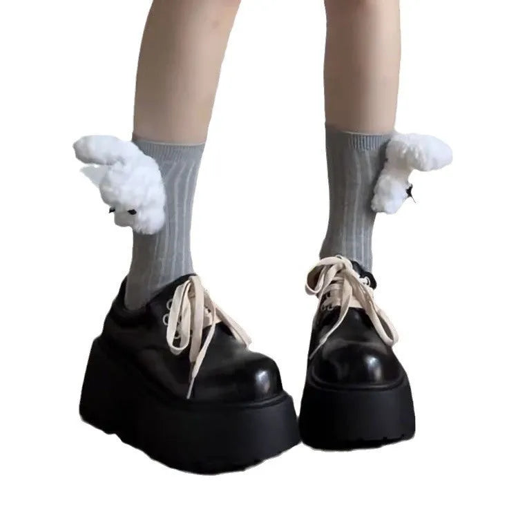Matte black women's lace-up ankle boots with a chunky 6-8 cm heel and thick rubber sole.