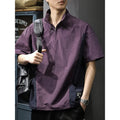 Men's brown half-zipped stand collar business shirt with short sleeves on hanger