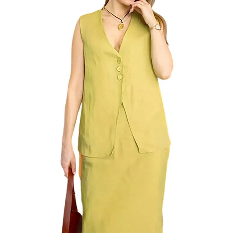 Women's blue polyester two-piece suit with sleeveless vest and long skirt on hanger