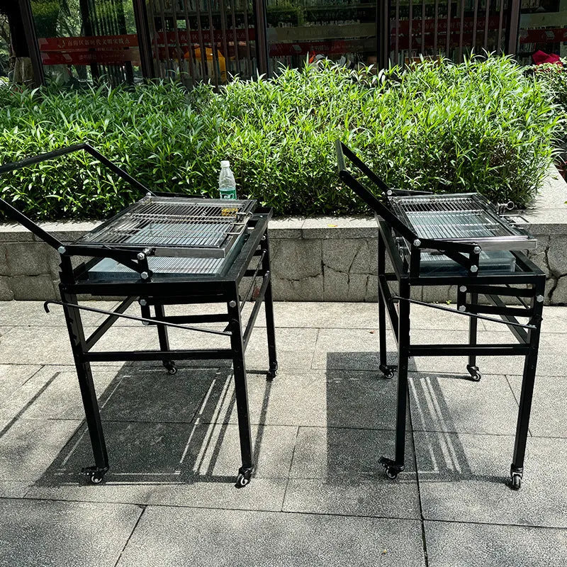 Foldable charcoal BBQ stove with detachable grill components for courtyard cooking