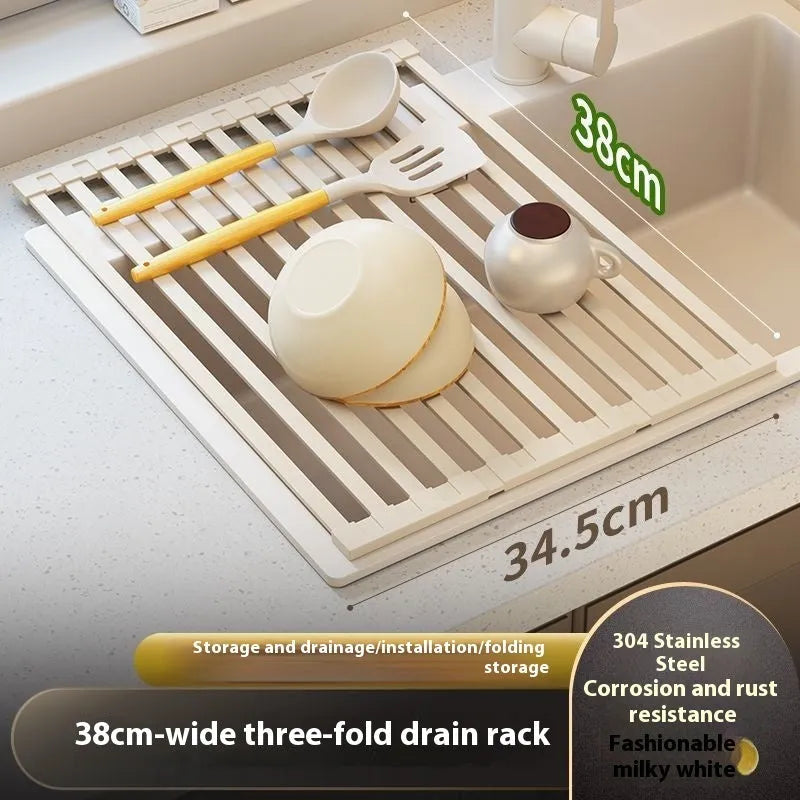 Foldable milky white stainless steel kitchen draining rack beside a sink