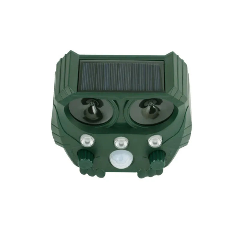 Green solar-powered ultrasonic animal repeller with motion sensor on a white background.