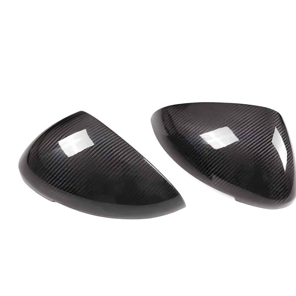 Carbon fibre rearview mirror covers for Porsche Macan with black finish and woven texture
