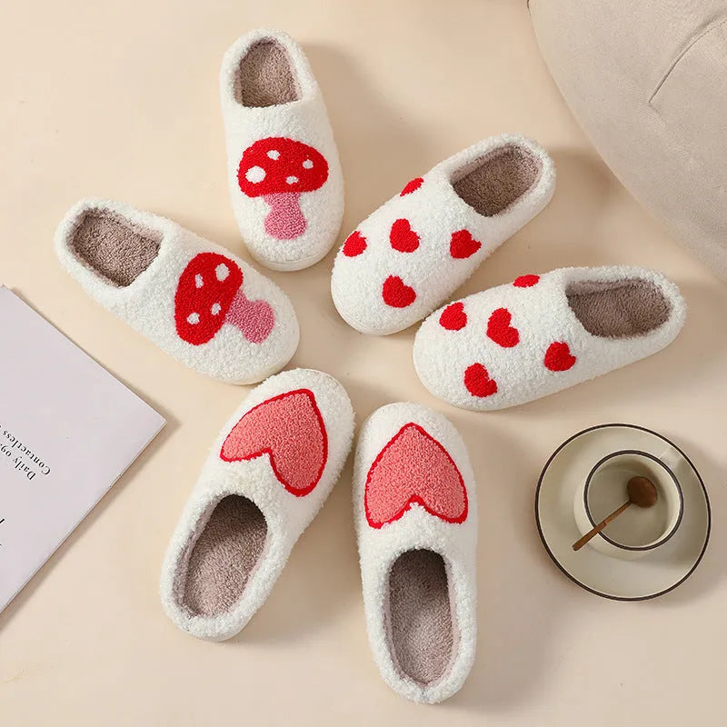 Adult women's plush cartoon-style home slippers with non-slip PVC soles in multiple colour options.