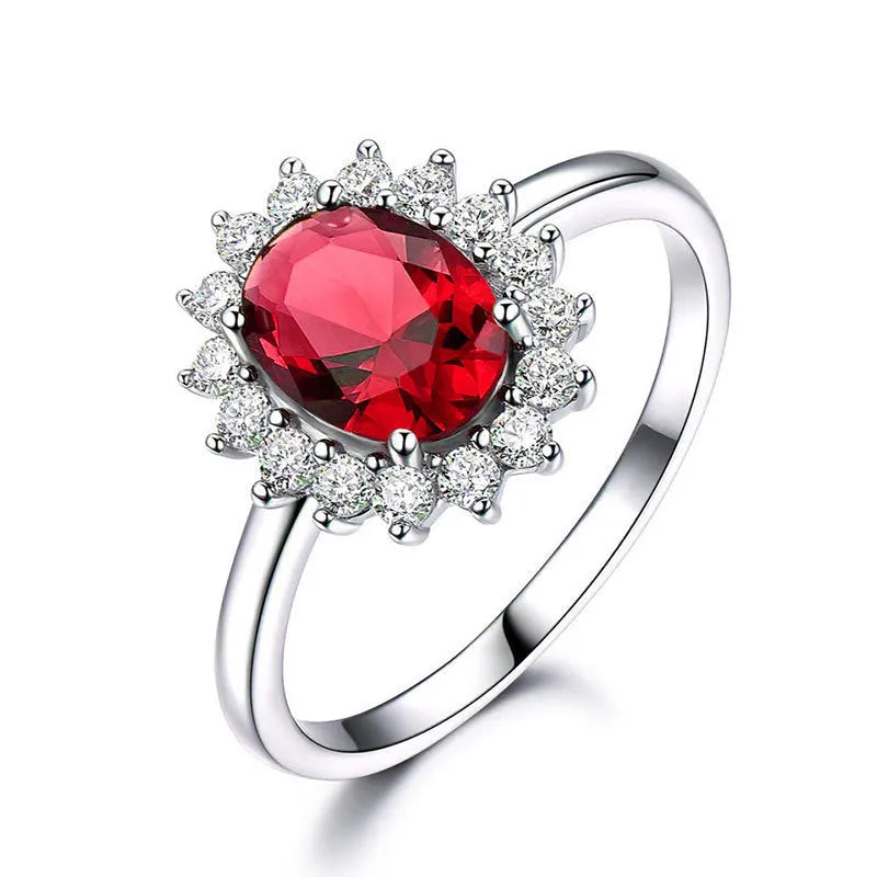 Electroplated copper flower-shaped ring with inlaid blue zirconium stone on a woman's finger.