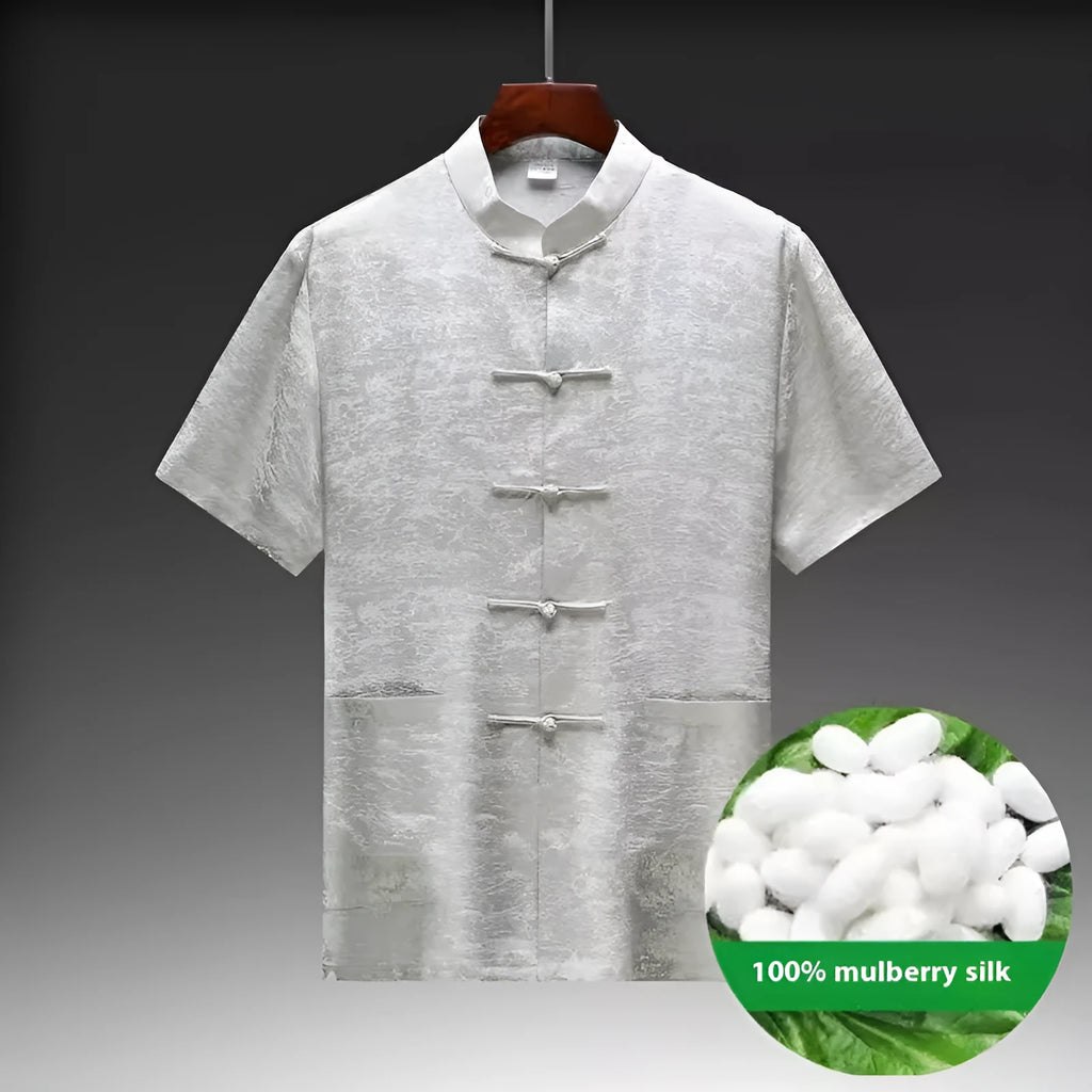 Mulberry silk Chinese style Tang suit for men in light green, showing traditional woven construction.